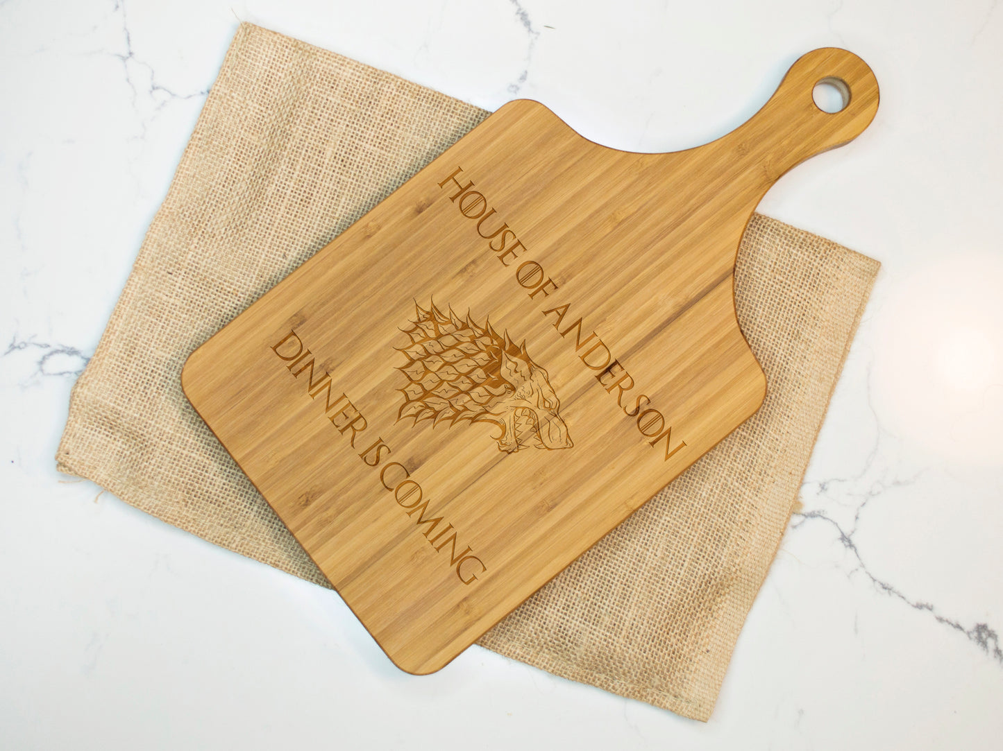 a wooden cutting board with a wine label on it