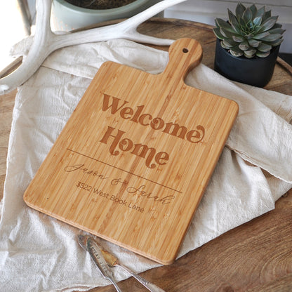 a wooden cutting board sitting on top of a table