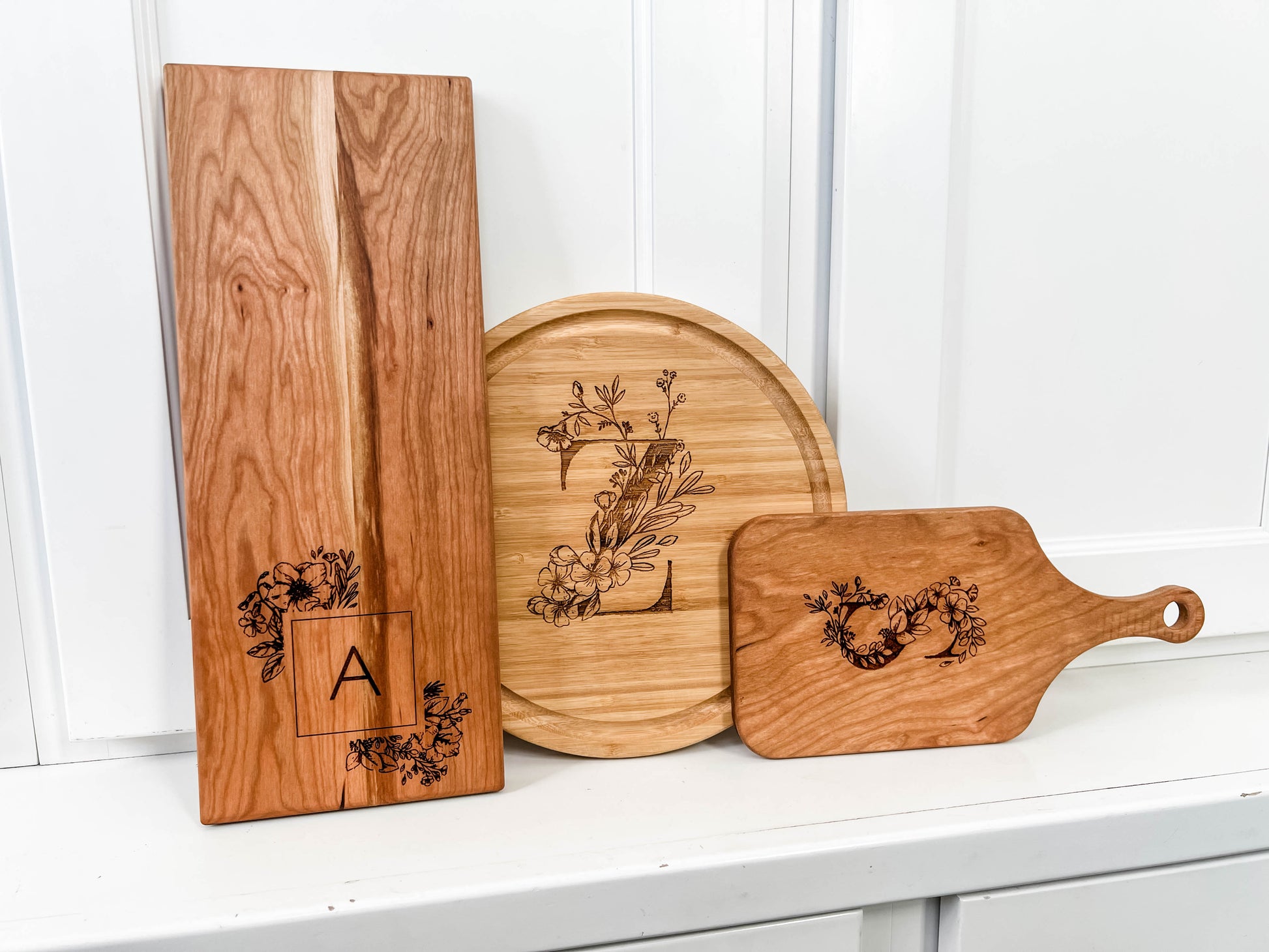 a couple of cutting boards sitting on top of a counter