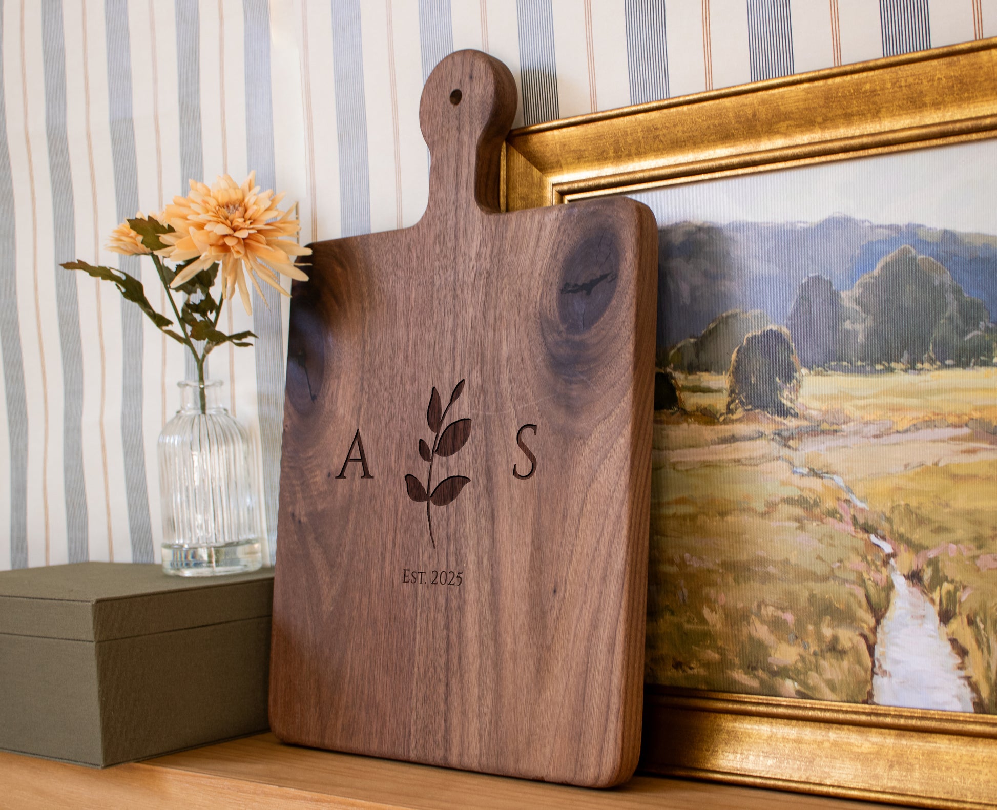 a wooden cutting board sitting on top of a table