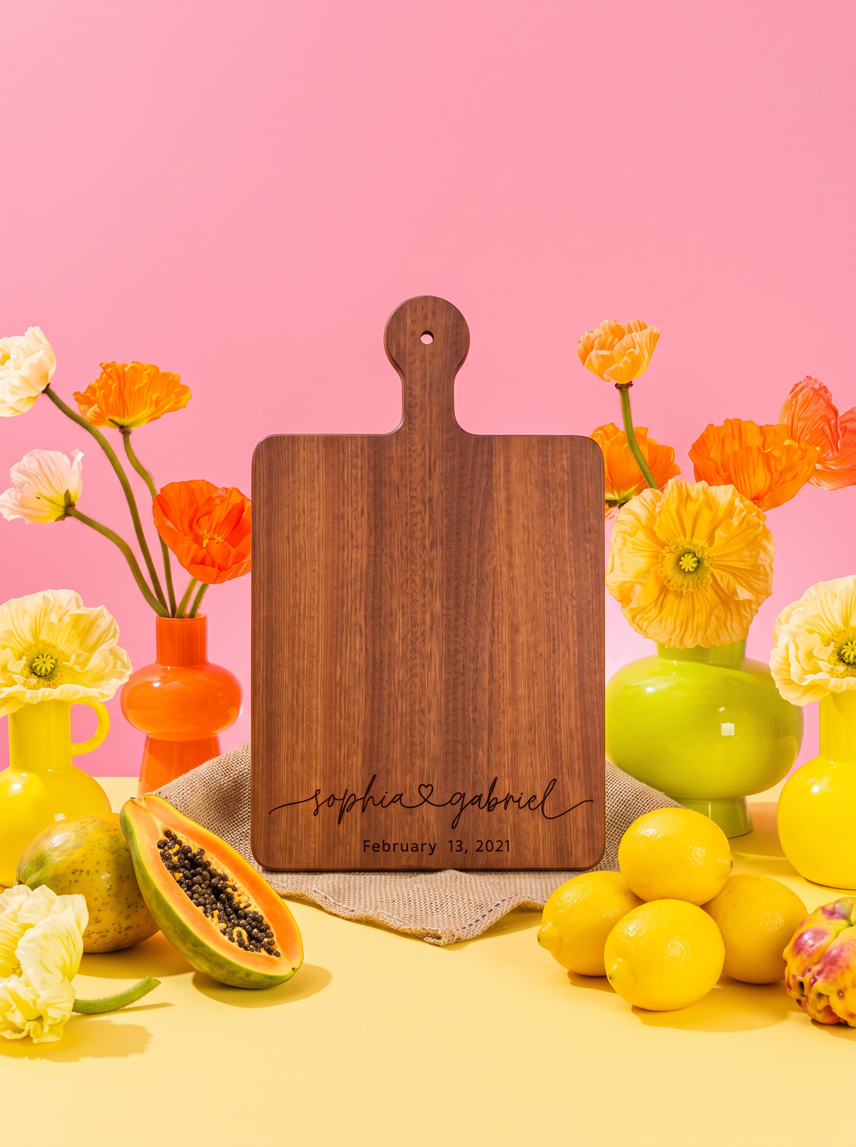 Engagement Charcuterie Board in a colorful floral setting