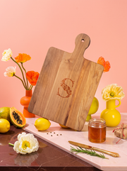 Monogram 3 Cutting Board in a colorful floral setting