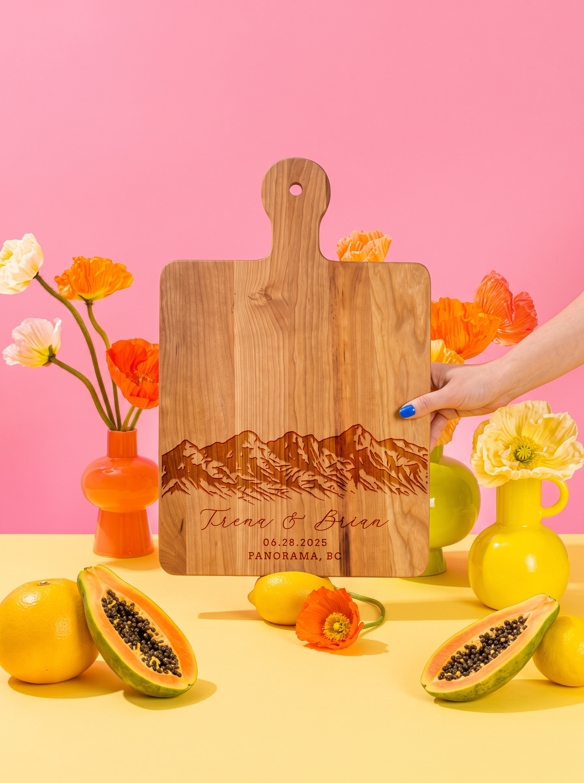 Mountain Range Wedding Cutting Board in a colorful floral setting
