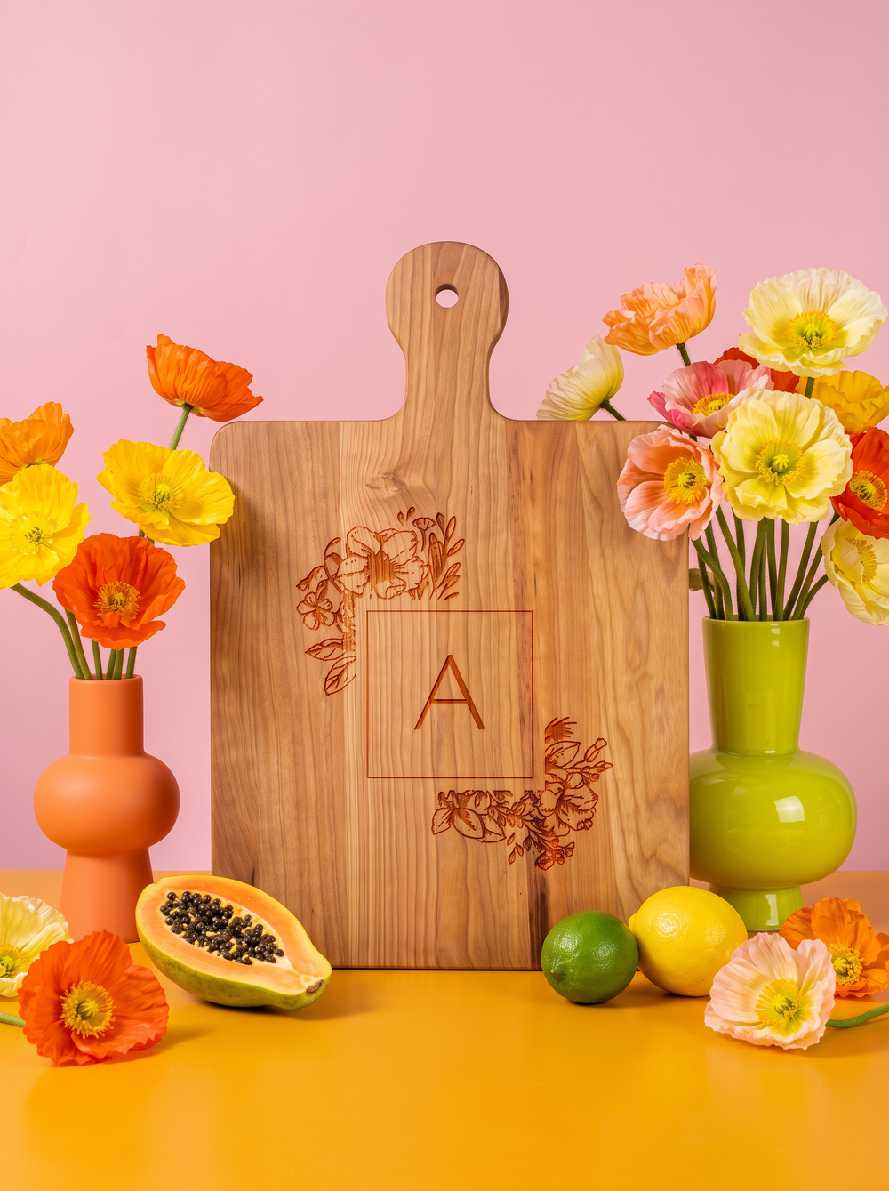 Floral Monogram Cutting Board in a colorful floral setting