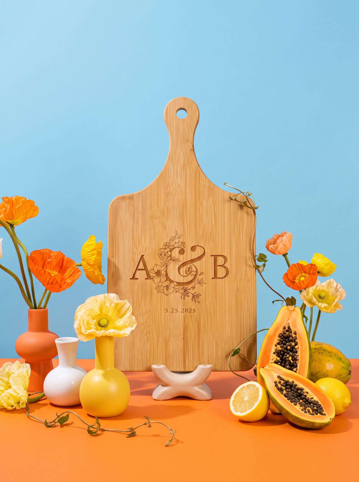Couple Initials Wedding Cutting Board in a colorful floral setting