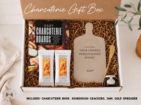 Charcuterie gift box with cookbook, sourdough crackers, jam and gold spreader