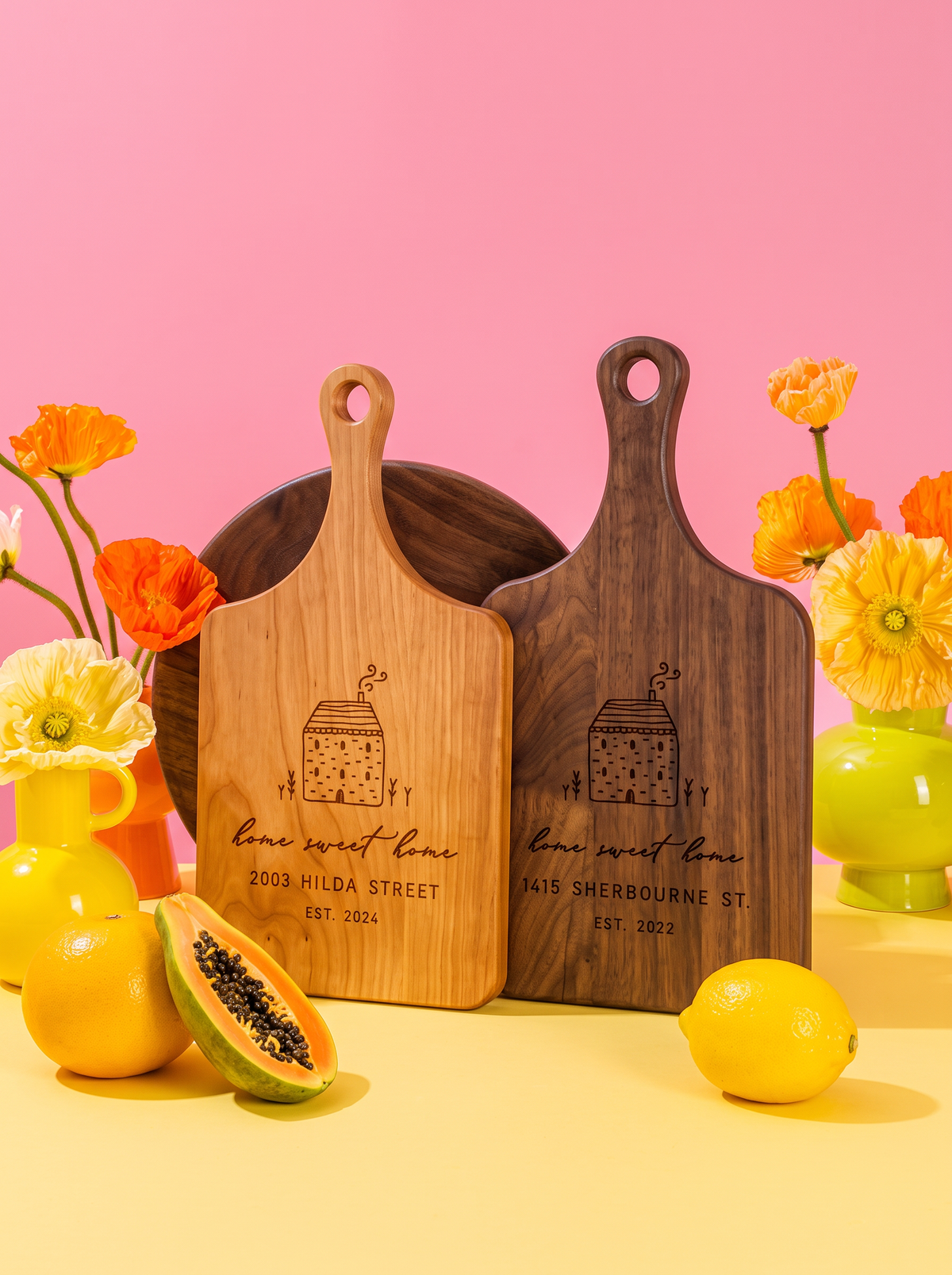 Home Sweet Home Cottage Cutting Board in a colorful floral setting