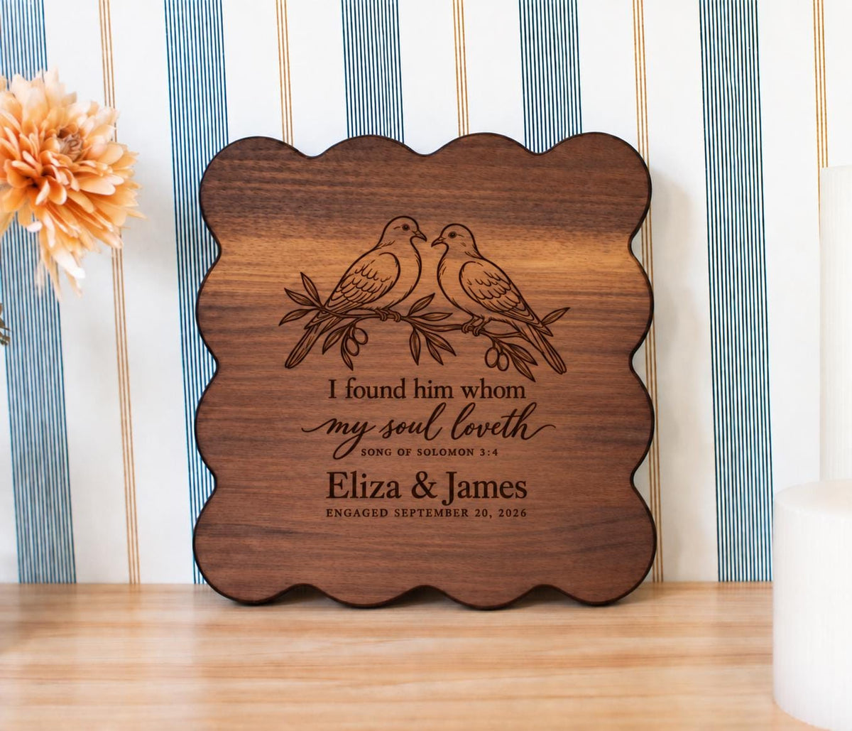 Edited mockup of the my soul dove design on a walnut scalloped board, with Eliza & James and an engagement date beneath the verse.