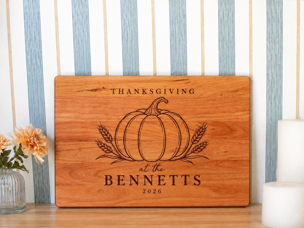 Pumpkin wheat Thanksgiving engraving mockup centered on a rectangular board, personalized BENNETTS 2026.