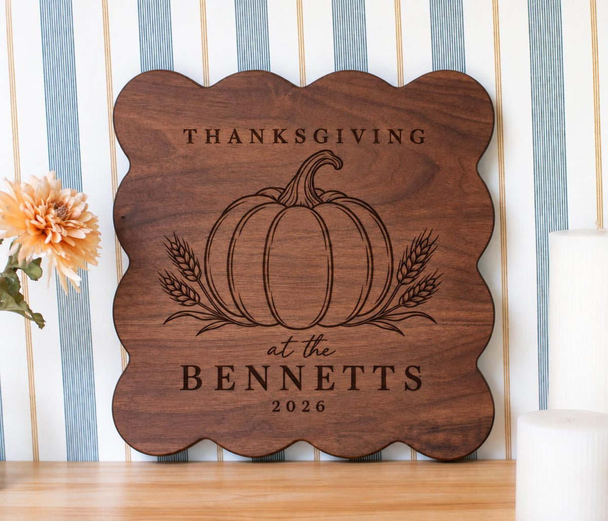 Pumpkin wheat Thanksgiving engraving mockup on a scalloped board, with BENNETTS and 2026 below the pumpkin and wheat.