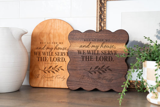 Simulated Serve the Lord engraving on an arched cherry board and scalloped walnut board, with family-name and year examples.