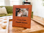 Edited mockup of the life of faith frame on a tray, showing MY BAPTISM, A Life of Faith, Daniel James, September 19, 2026 and an illustrative baby baptism photo.
