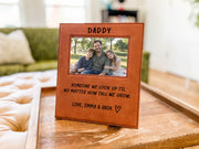 Edited mockup of the tall we grow Daddy frame on a tray, with a sample dad-and-children photo, engraved saying, Love, Emma & Jack signature and outline heart.