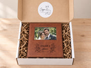 Wedding Roses frame mockup with a sample wedding photo, OUR WEDDING DAY, roses, Charlotte & James and June 14, 2026, in an open gift box with crinkle paper.