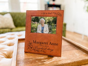Edited memorial frame mockup on a tray, showing a life so loved, a songbird, Margaret Anne, 1939-2025 and Remembered always around an illustrative portrait.