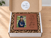 Grad Cap engraved frame reading Class of 2027, Olivia Bennett, Westbridge High School, with an illustrative graduation portrait. Edited mockup with sample personalization.