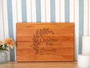 Personalized Christmas Eve cutting board; edited mockup.