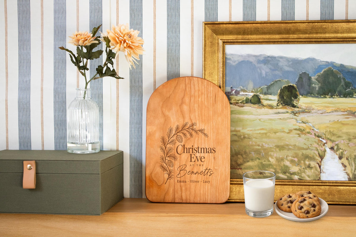 Personalized Christmas Eve cutting board; edited mockup.