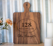 Personalized First Home Plaque cutting board; edited mockup.