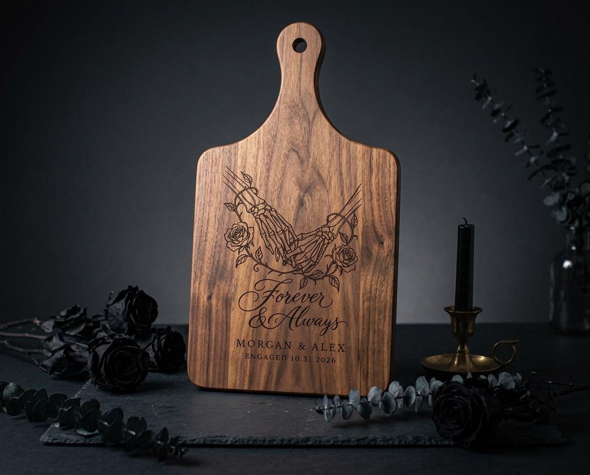 Forever Hand in Hand cutting board design with skeleton hands, roses, and sample names Morgan & Alex