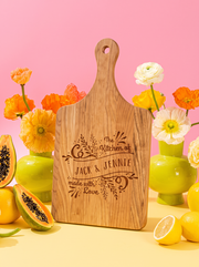 Made with Love Kitchen Cutting Board in a colorful floral setting