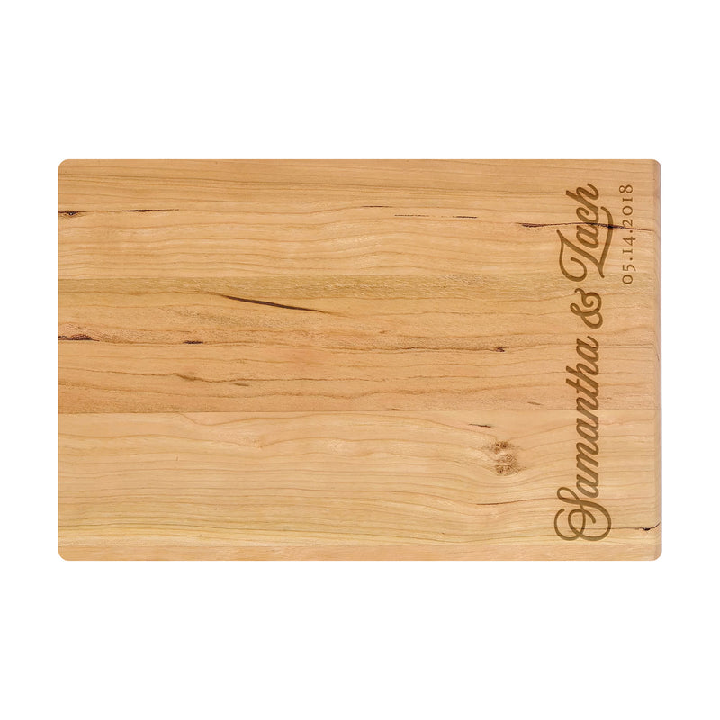a wooden cutting board with a name on it