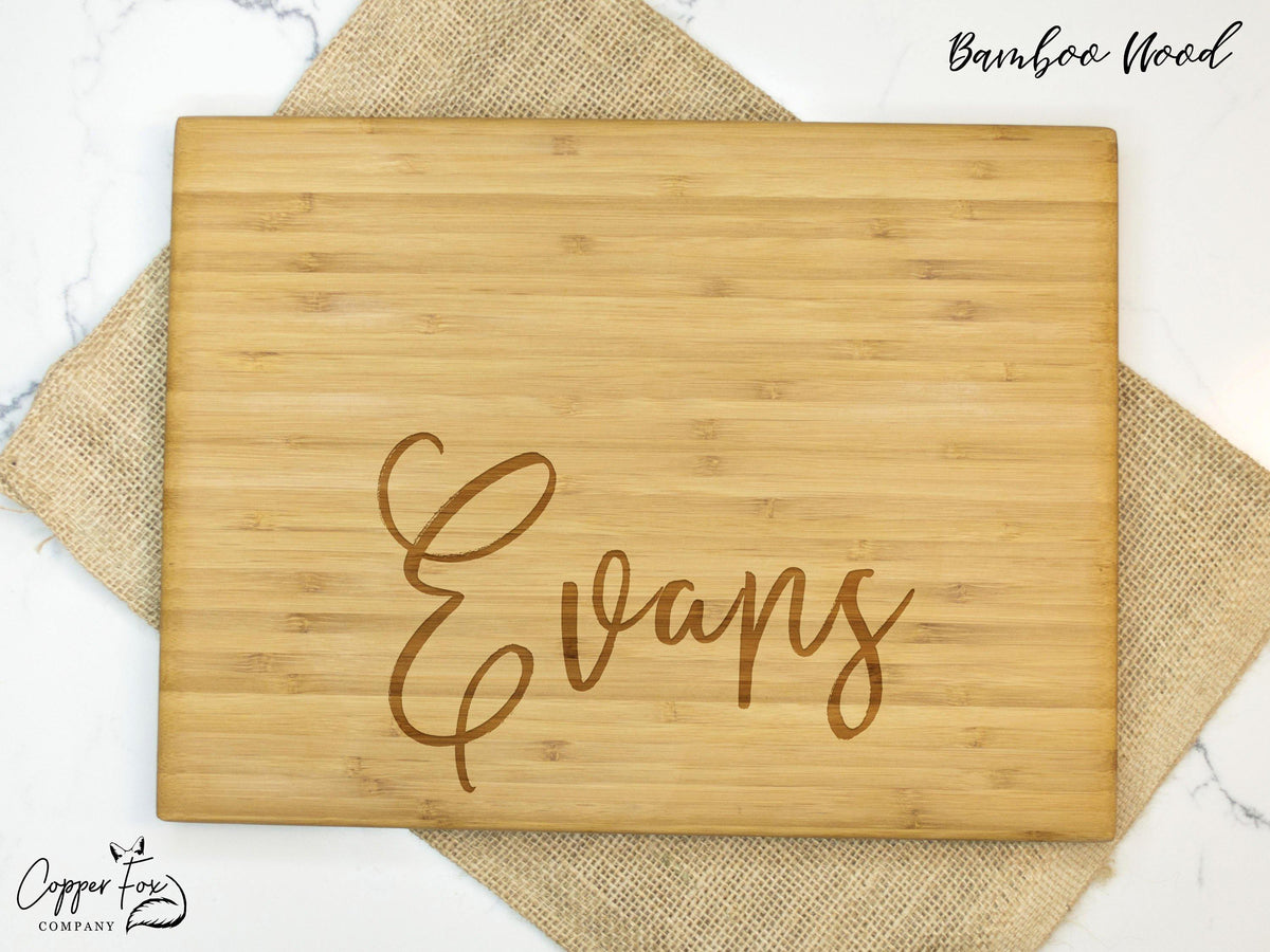 Modern Cursive Family Name Cutting Board